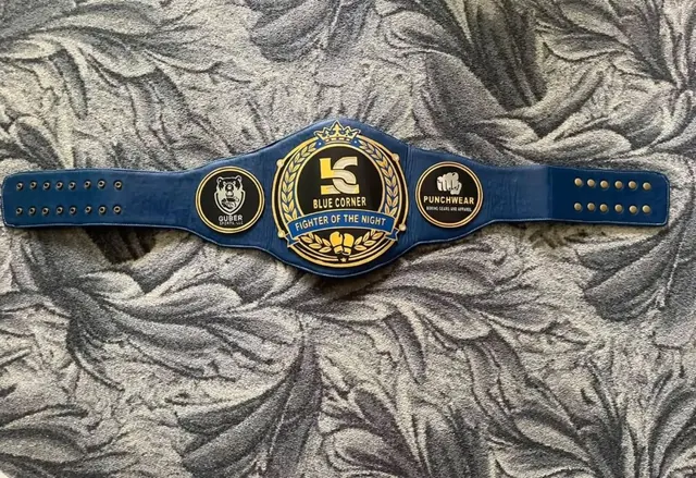 Fighter of the Night belt with sponsor plates